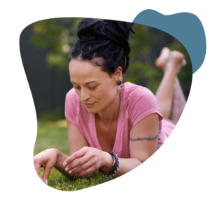 Woman laying in grass